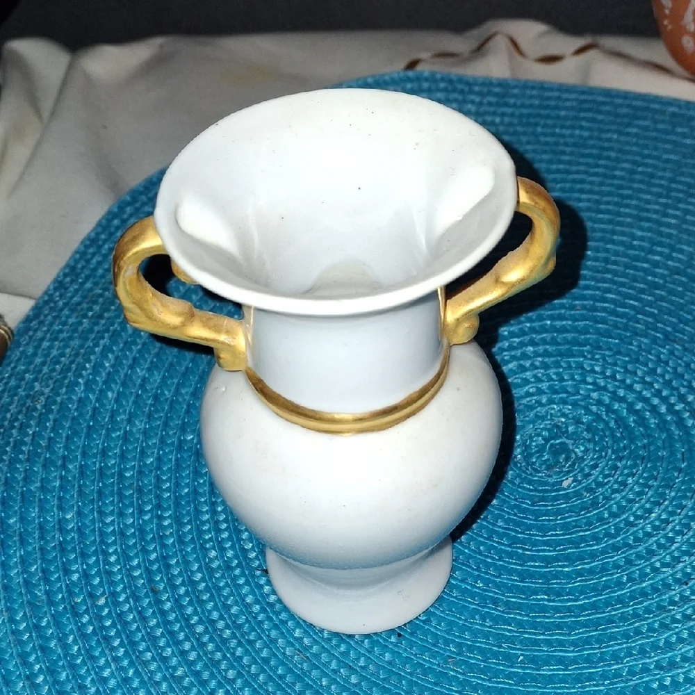 Elegant White Vase with Gold Accents